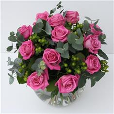 A Dozen  bright Pink Roses or More